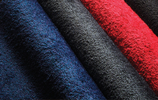 Blue, dark gray, red, and black colorful carpet mats